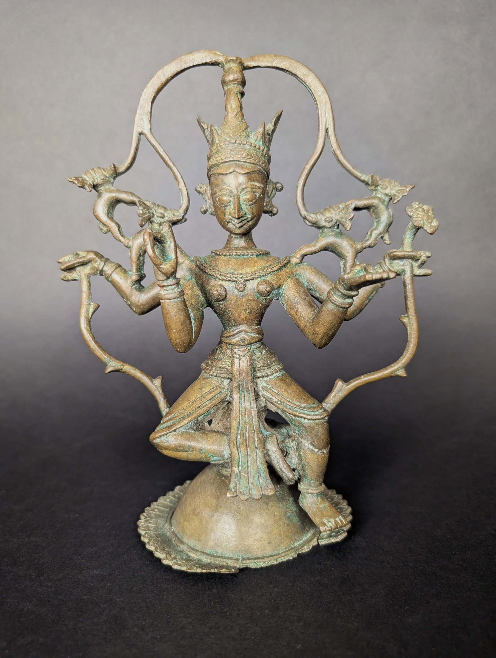 Gajalakshmi 4 arms, 4 elephants, Odisha India: This larger folk-style Gajalakshmi originates from Odisha. There are four elephants annointing Lakshmi with water, a ritual form of worship (abisheka). The four elephants represent the four cardinal