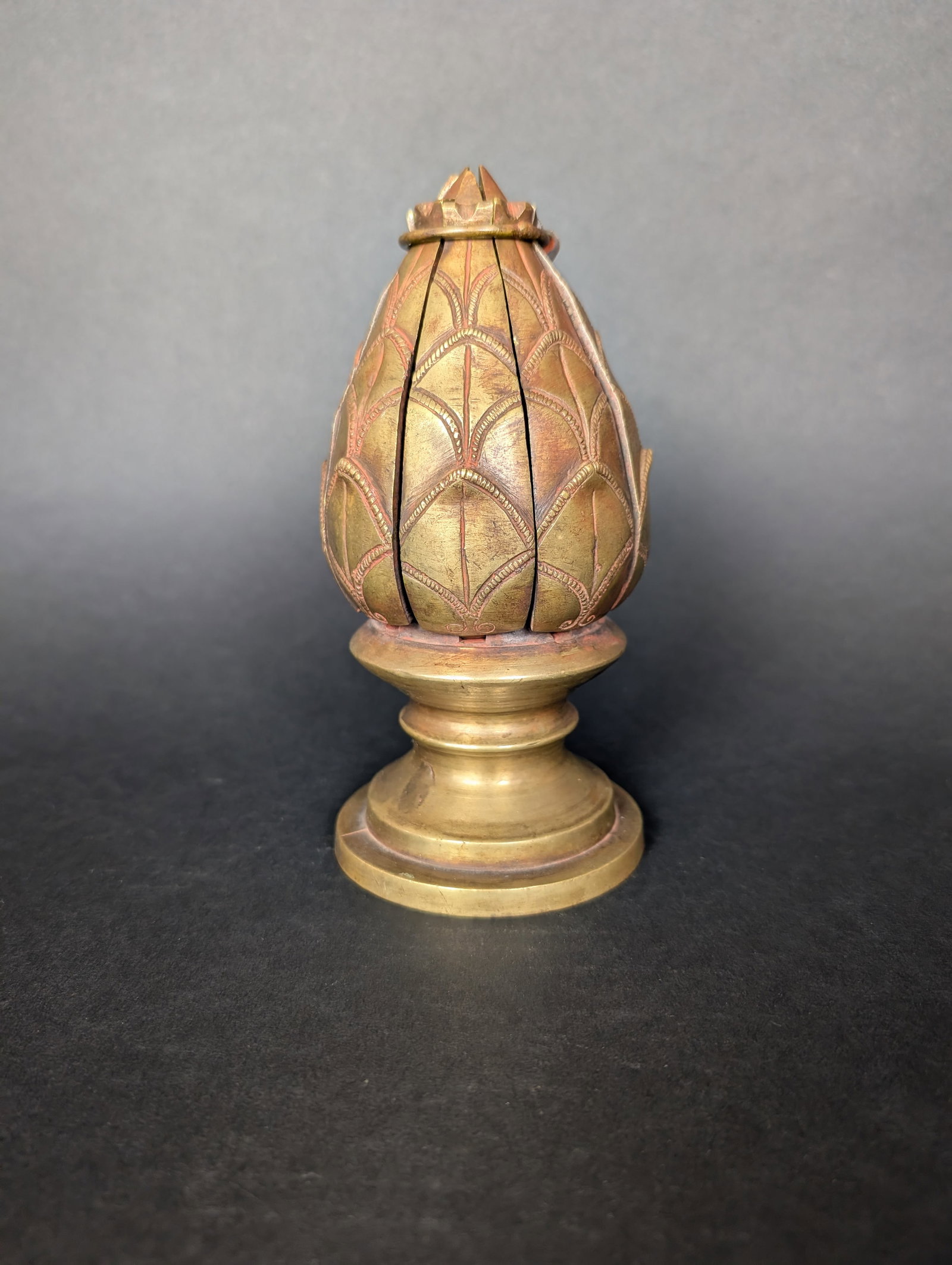 Jain Lotus Mandala, Early 20th c Brass unfolding mechanism: The Lotus Flower Mandala features 24 Jain Tirthankaras. Some authors say this Flower Mandala was used as a travelling shrine. The open petals reveal the images of the 24 Tirthankaras. And one Jina sit