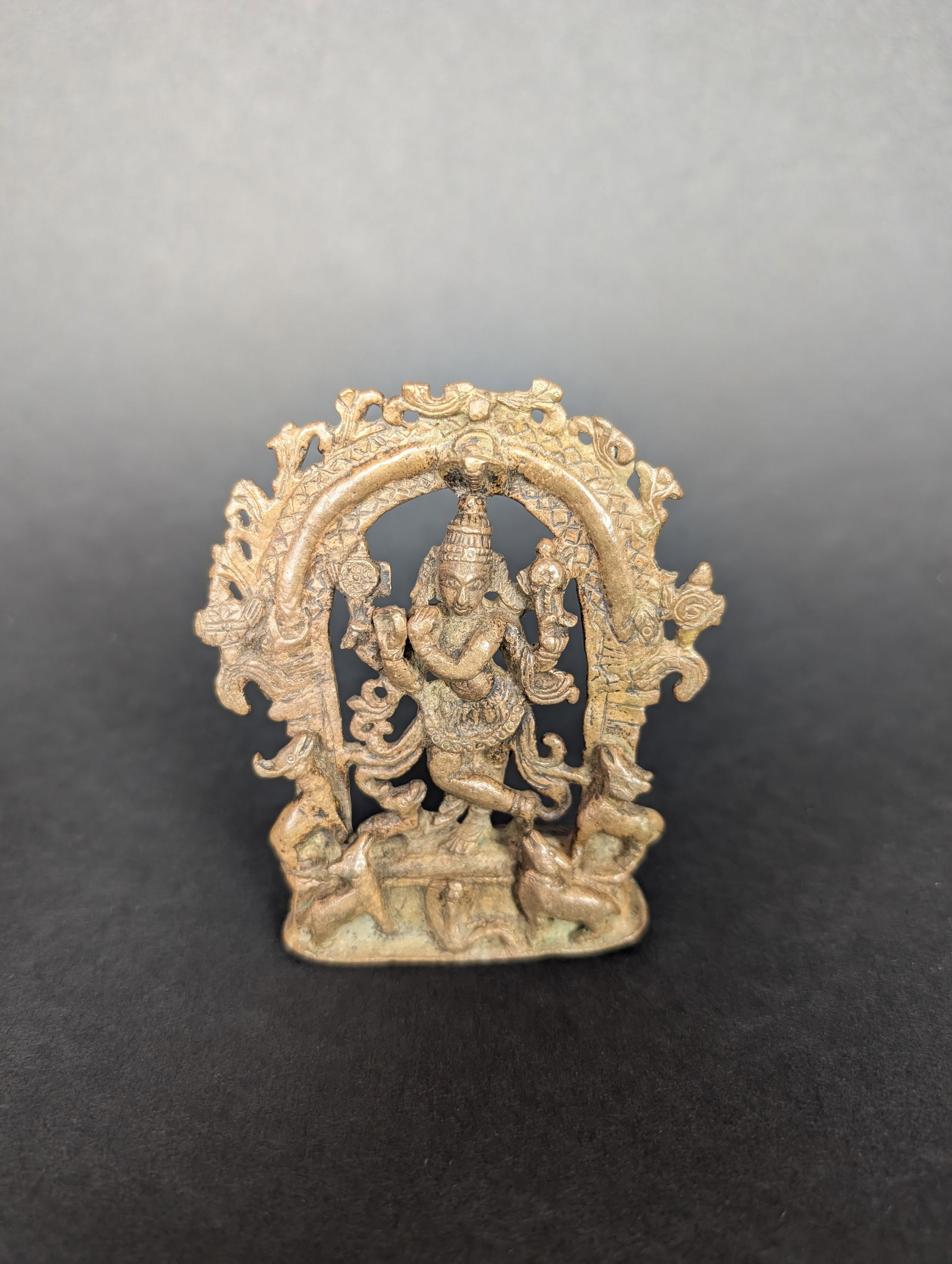 Venugopal with Cows and a snake: A very sweet rendition of Krishna, one of Vishnu's avatars, as a cowherd and flute player. He is four-armed and is holding Shankha and Chakra, Vishnu's attributes, in his rear hands. He is shown with