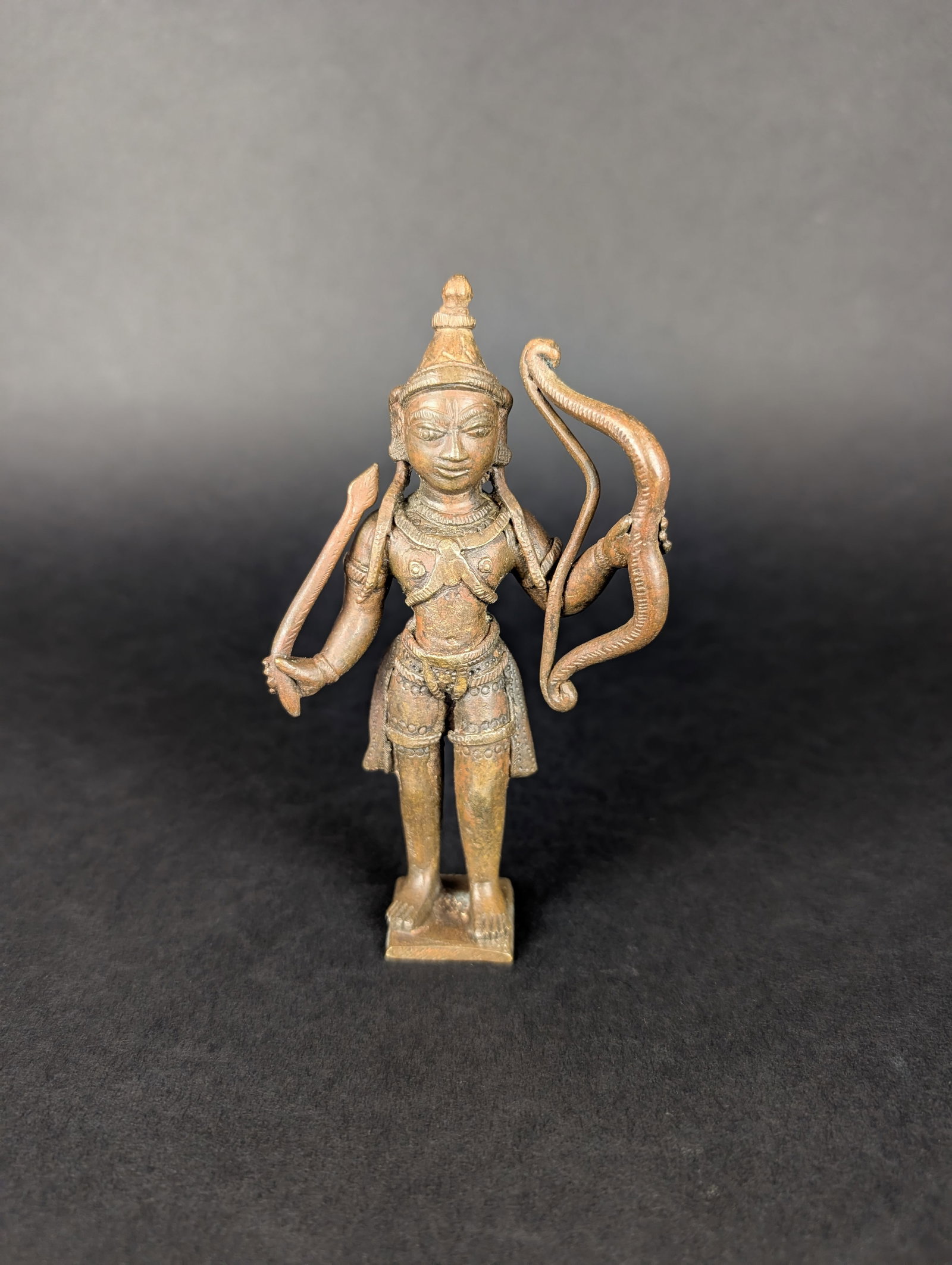 Rama with large bow and arrow: This folk-style Rama is from the Telugu-speaking area of India. Rama is one of the Avatars of Vishnu, and the Ramayana centres around his life and tribulations. Normally, his bow is cast separately an