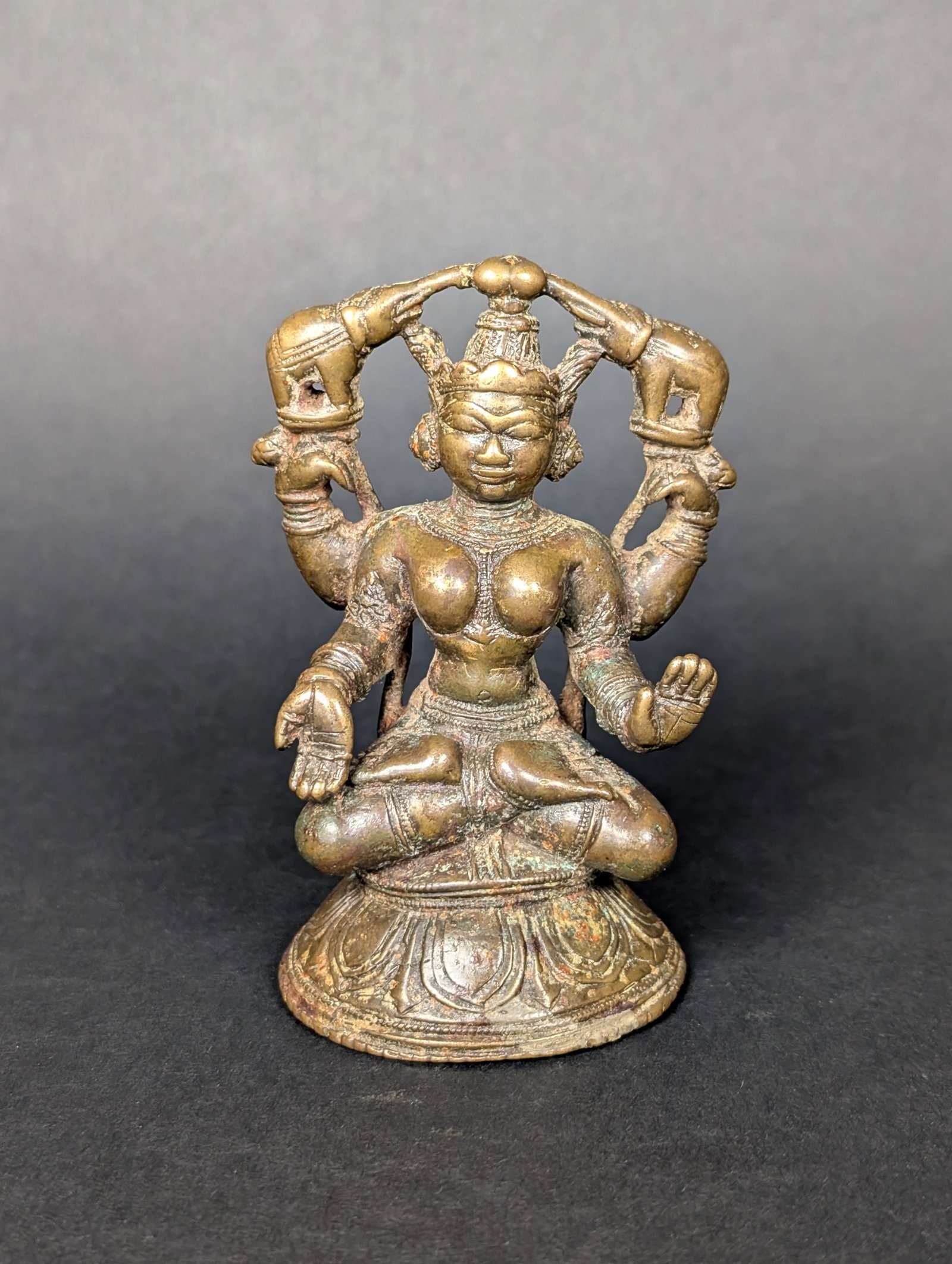 Gajalakshmi: This is Gajalakshmi, in classical style. It shows the four elephants, representing the four cardinal directions, annointing her with a blessing of water. Gajalakshmi is one of the ancient motifs of