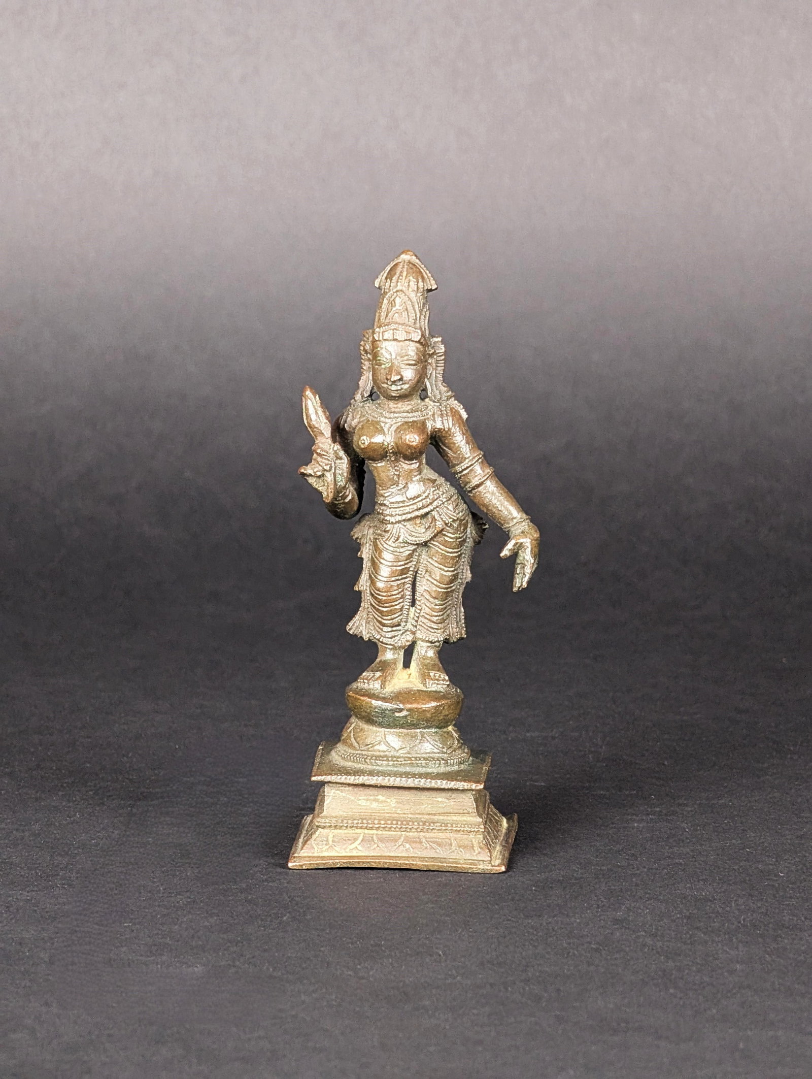 Parvati, Goddess and Consort of Shiva: Parvathi, consort of Shiva. She is also known as Uma. This is a well-cast bronze, full of charm and grace. It is challenging to get something of this quality. Estimated age is 19th century. Dimensions