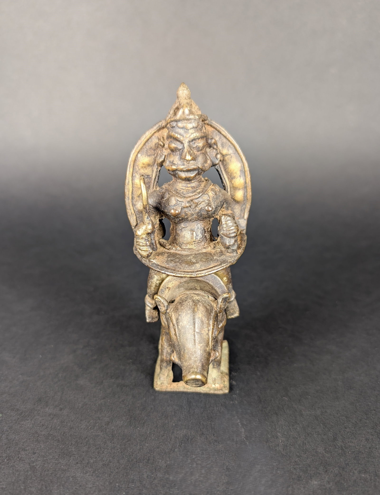 Panjurli with Rider: The boar rider is worshipped as Panjurli in the coastal region of Karnataka. This worship is Totemic in origin. It is a two-piece casting, the boar and the rider. It is encrusted with layers of