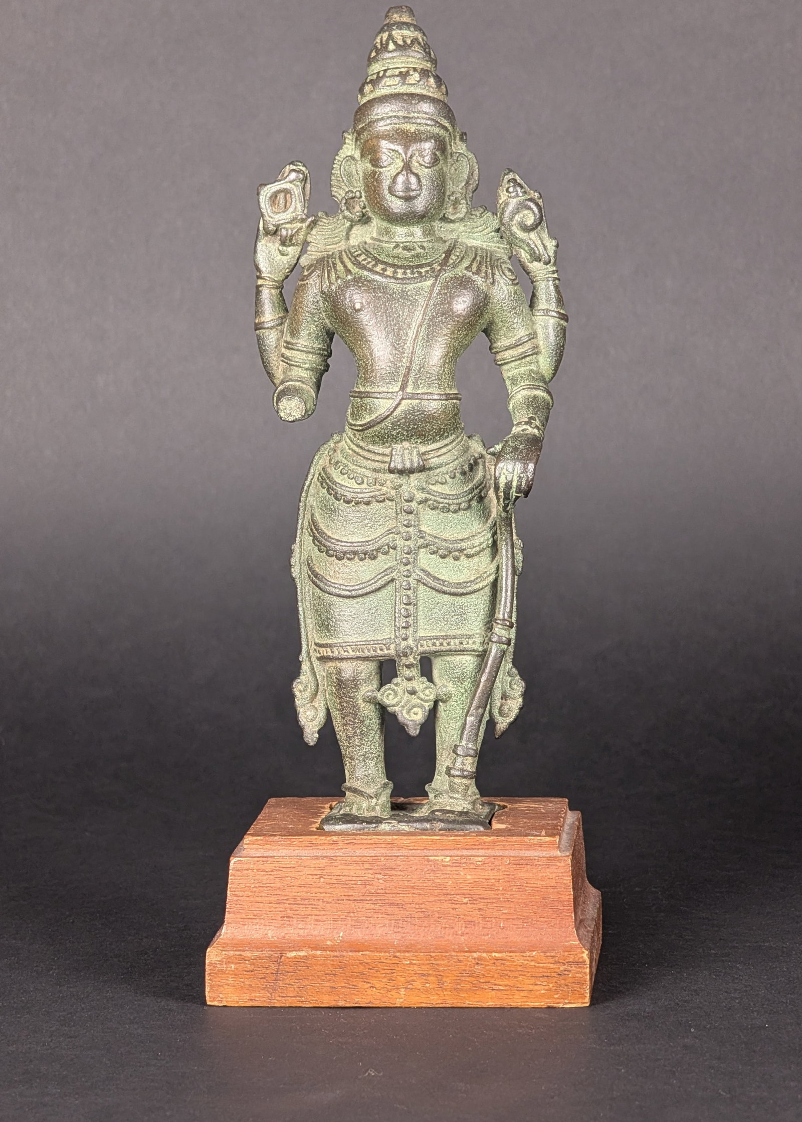 Standing Vishnu, Kerala, 16th century: This is Vishnu, identified by Chakra and Shankha in his rear hands. In his left lower hand, he carries the Gada, which reinforces the identification of Vishnu. Unfortunately, his lower right hand is