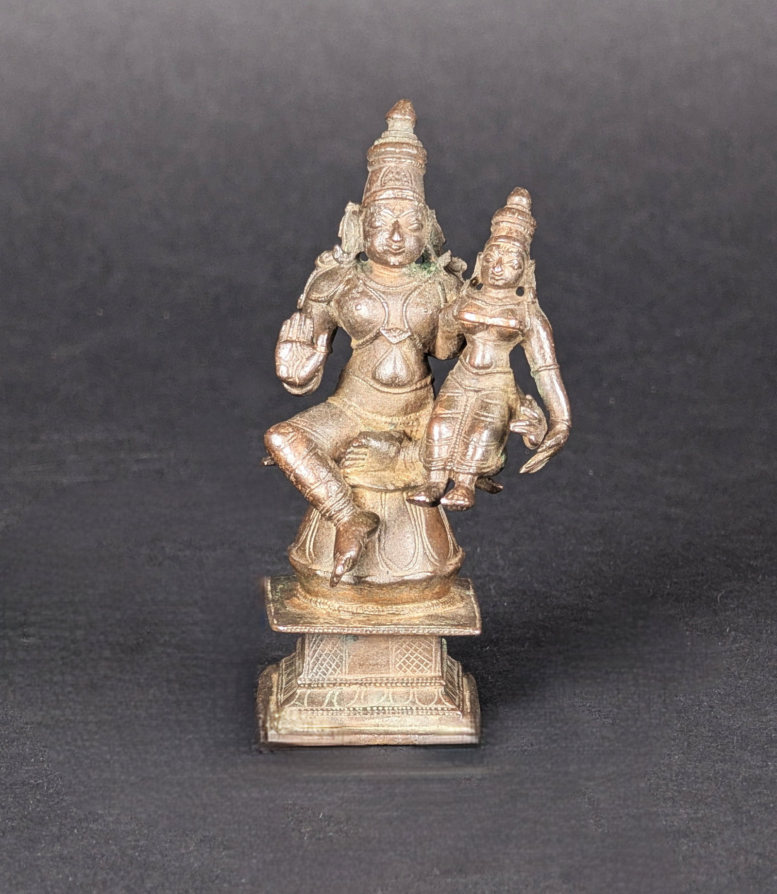 SitaRama: This is a delightful and fine bronze of Sitarama. Rama is an avatar of Vishnu, and Sita is his consort. Rama's right hand shows Abhaya mudra, assuring protection. Estimated age is late 19th century.