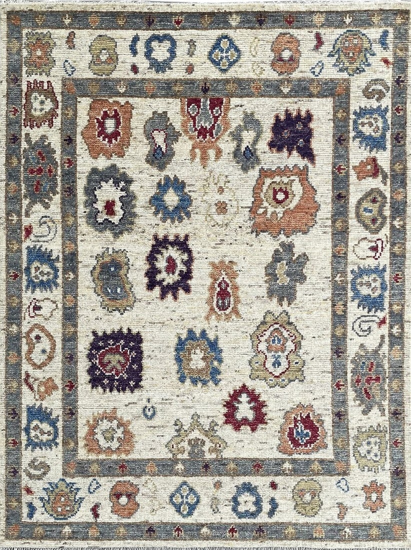 Oushak Hand-Knotted Wool Area Rug 9' x 12', Ivory: Oushak area rug, hand-knotted in wool, in ivory tones, brand new, approximately 9' x 12' (108 x 144 inches, 0.5-inch pile), a room-anchoring 9x12 size. The light cream field serves as a serene backdro