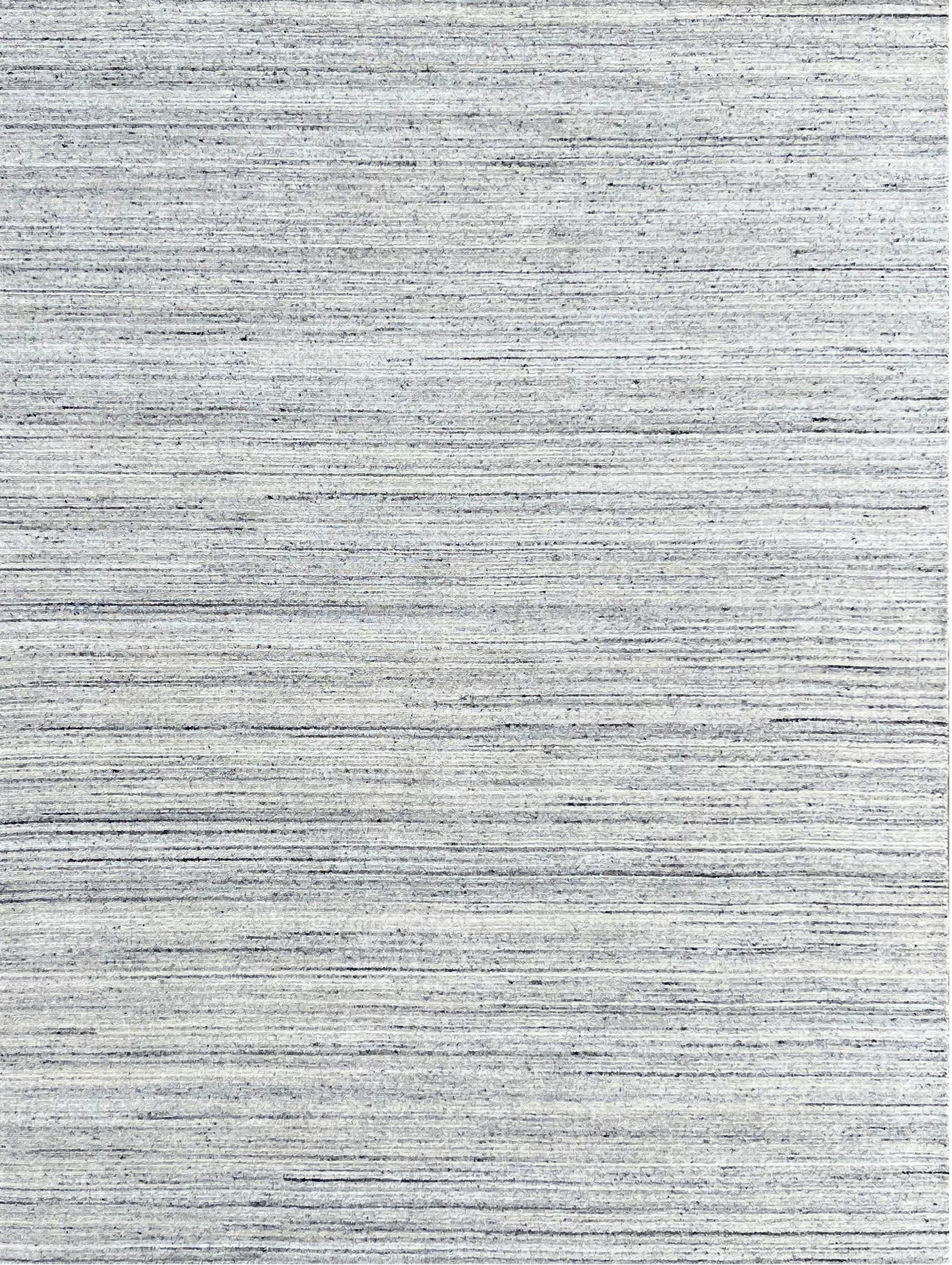 Lori Baft Solid Color Hand-Knotted Wool Rug 6'x9': Lori Baft Solid Color area rug, hand-knotted in wool, in natural silver tones, brand new, approximately 6' x 9' (72 x 108 inches, 0.5-inch pile), a versatile 6x9 size. This rug offers a masterclass in