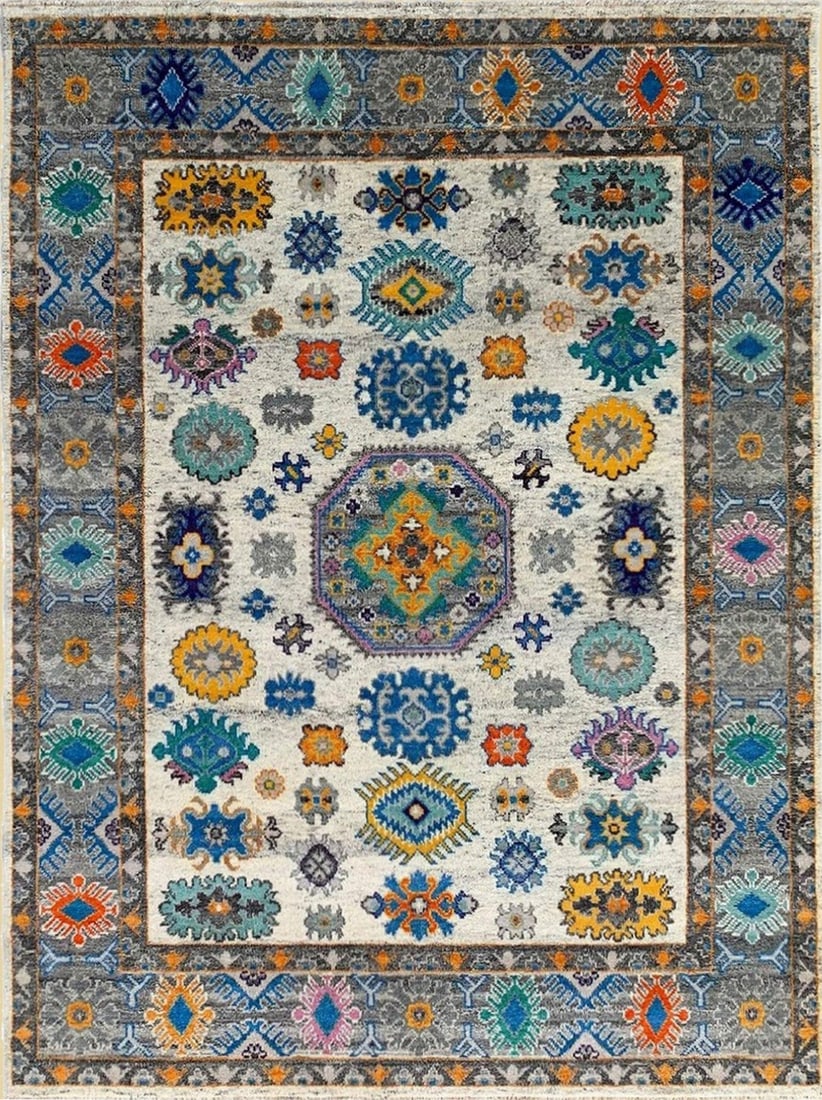 Kazak Hand-Knotted Wool Area Rug 9' x 12', Ivory: Kazak area rug, hand-knotted in wool, in ivory tones, brand new, approximately 9' x 12' (108 x 144 inches, 0.5-inch pile), a room-anchoring 9x12 size. A striking central medallion, shaped like an octa