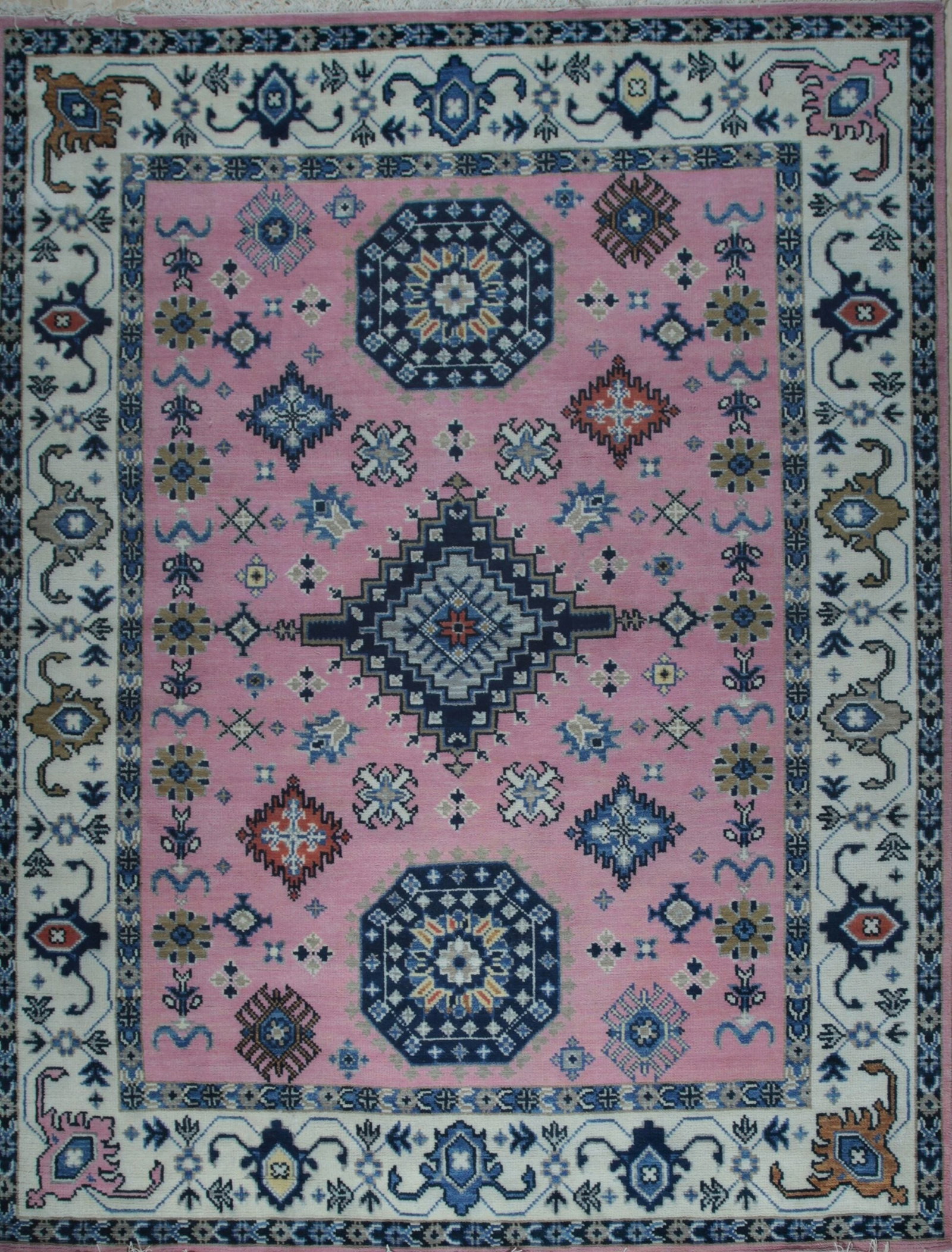 Kazak Hand-Knotted Wool Area Rug 8' x 10', Lt.Fuchsia: Kazak area rug, hand-knotted in wool, in lt.fuchsia tones, brand new, approximately 8' x 10' (96 x 120 inches, 0.5-inch pile), a versatile 8x10 size. This design is centered around a Persianinspired o