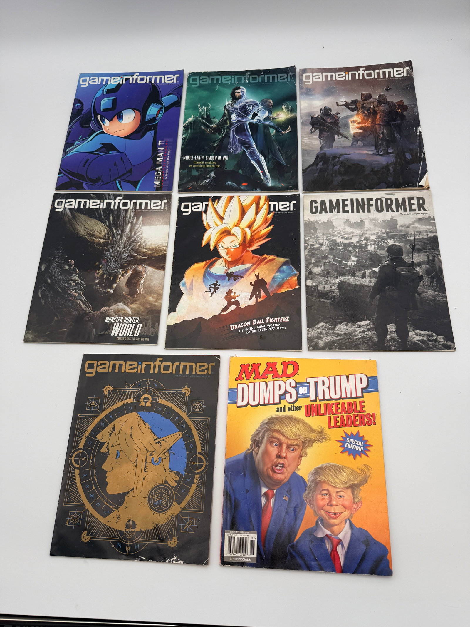 Game Informer & MAD Magazine Lot: Lot of 8 magazines including Game Informer video game issues and MAD Special.