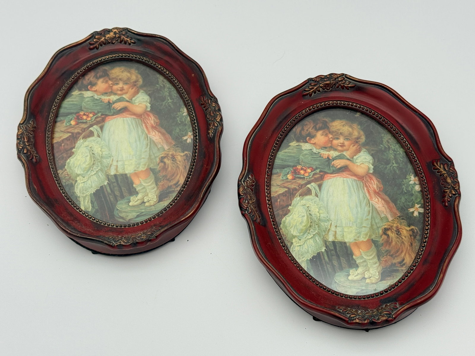 Vintage Framed Child Prints Pair: Pair of ornate framed child prints with easel backs. Vintage, maker unverified.