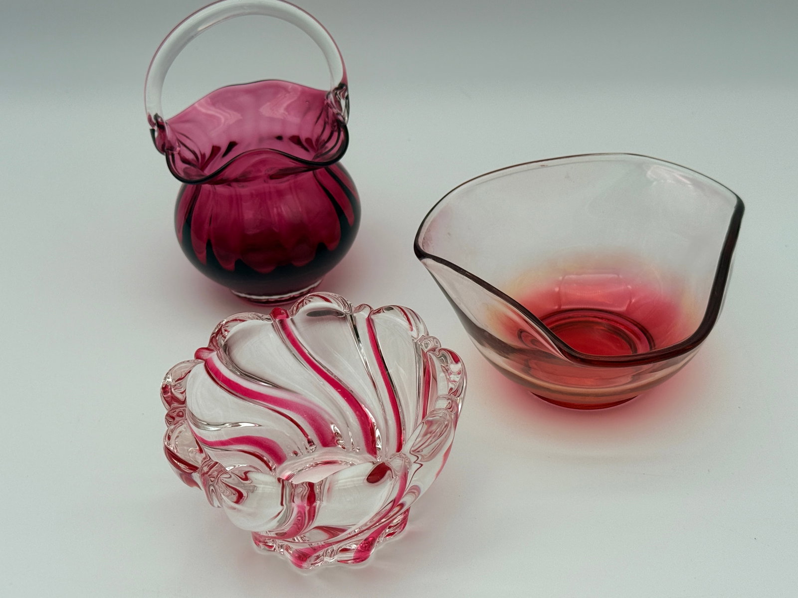 Vintage Art Glass Decor Lot: Three vintage art glass pieces. Includes Home Essentials handled vase.