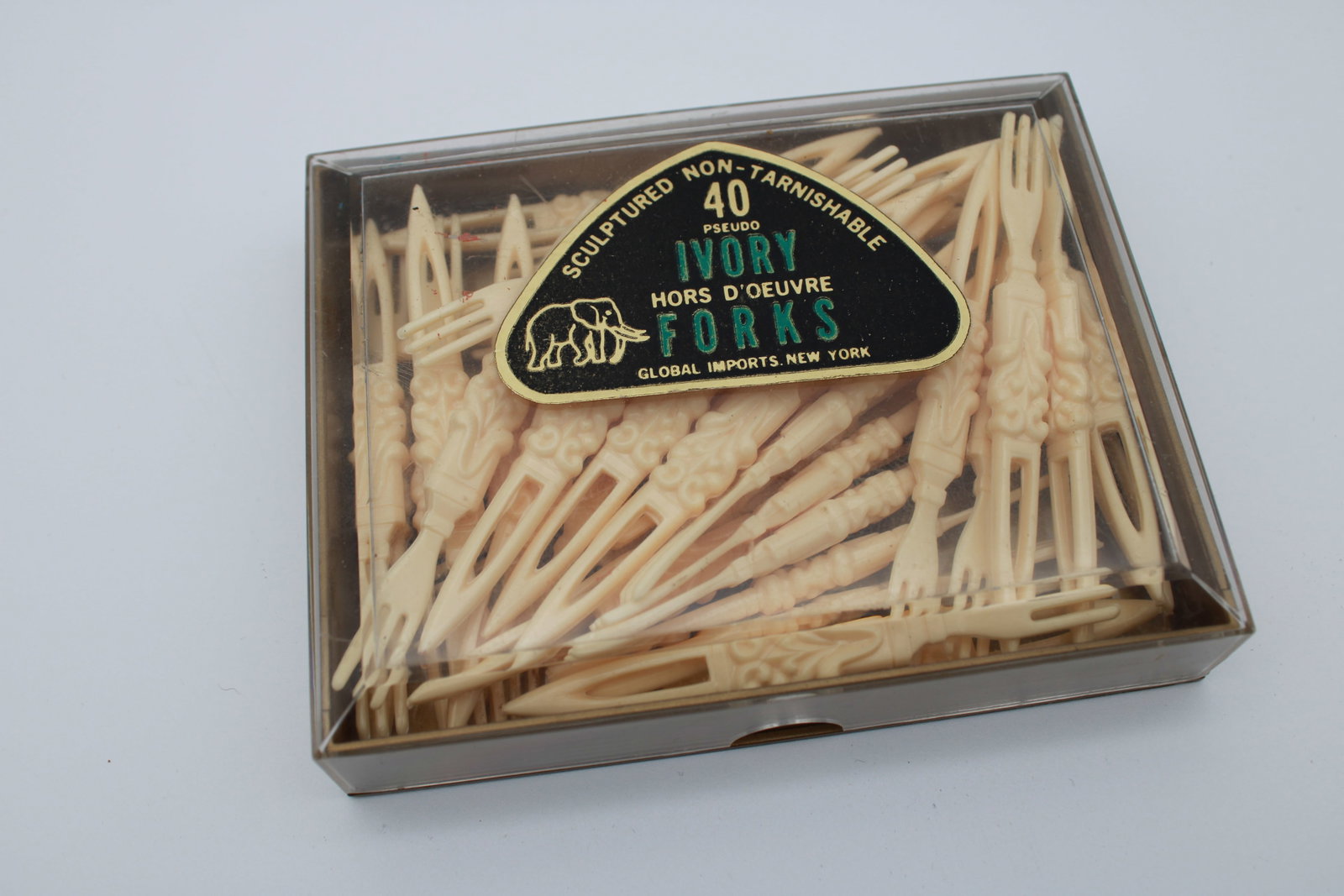 Vintage Sculpted Ivory Hors D'oeuvre Forks with Box USA: 5" x 4" x 1" Box. Not counted, Box seems full.
