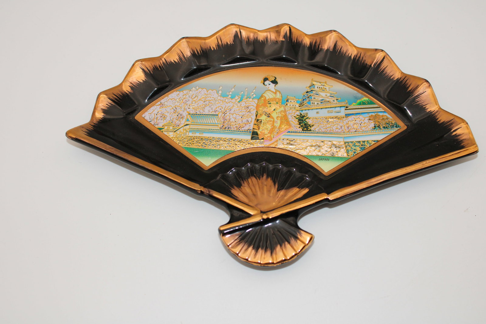 The Art of Chokin Japanese Fan Porcelain Dish: 11" x 7" with information on the bottom