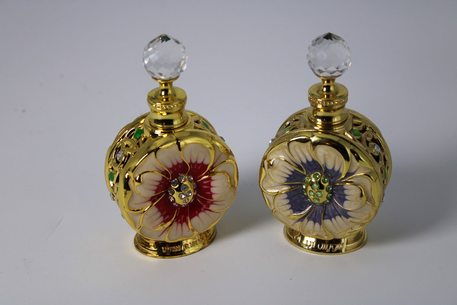 Swiss Arabian Layali Perfume Oil Bottle Set: 2 decorative 15ml bottles labeled Layali and Layali Rouge; each measures 4.5" x 2.25" x 1.5"