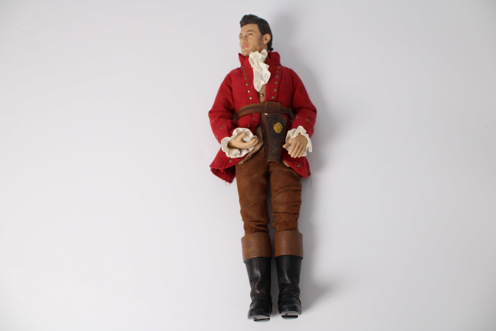 Disney Beauty and the Beast Gaston Doll: 12" articulated character doll in fabric costume with belt and holster; clothing shows light wear and fraying
