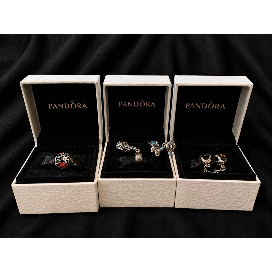 Pandora Disney Parks S925 4 Charm Lot Mickey Dumbo Boxes: Authentic Pandora Disney Parks sterling silver (S925 ALE) 4 charm lot featuring Mickey enamel charm, Dumbo dangle charm (stored in zip bag), Mickey & Minnie safety chain, and additional Disney-themed 