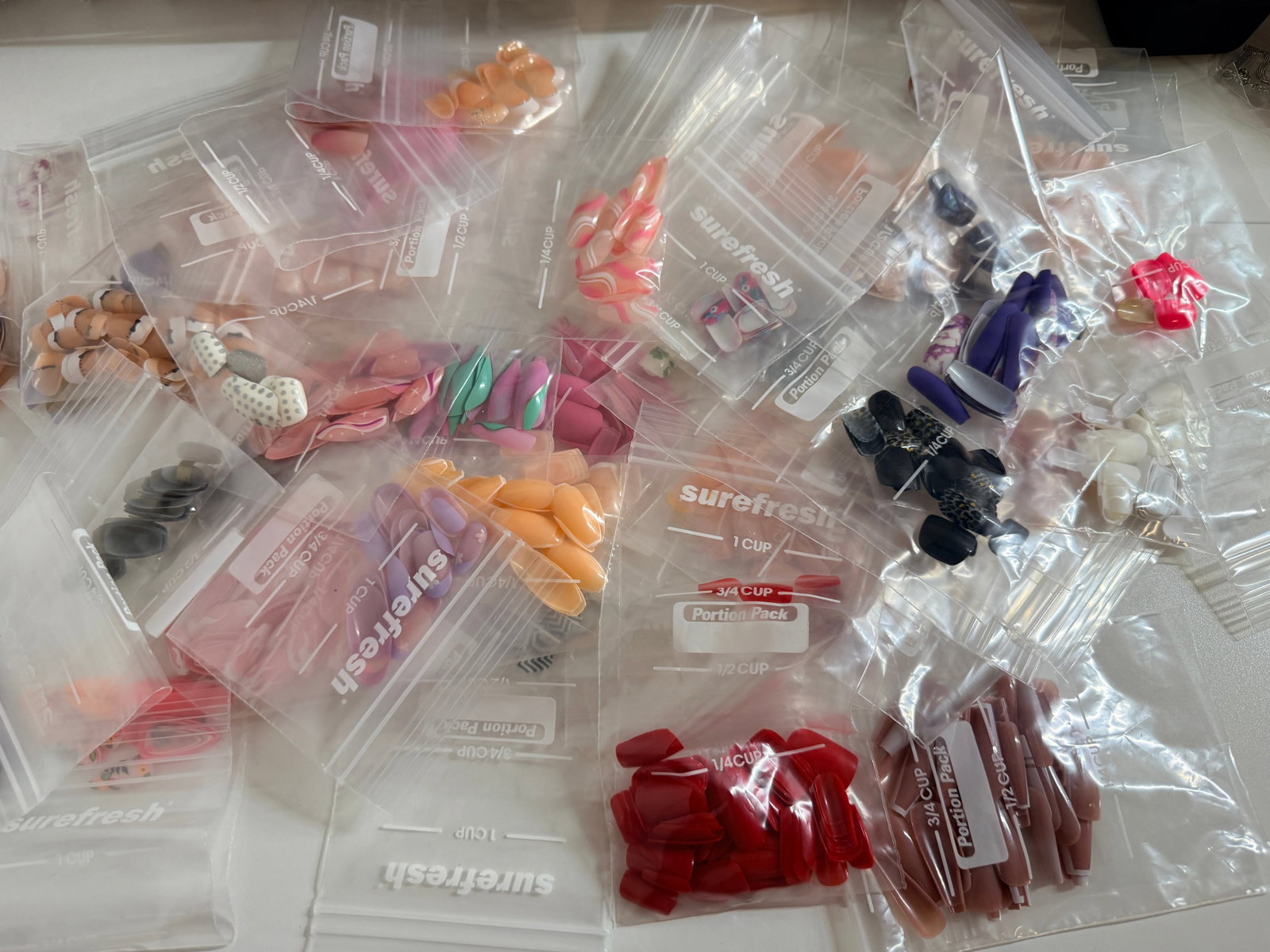 Large lot of manicure 30+ different design nail sets: Removed from original boxes and put in zip bags (by beauty parlor)
