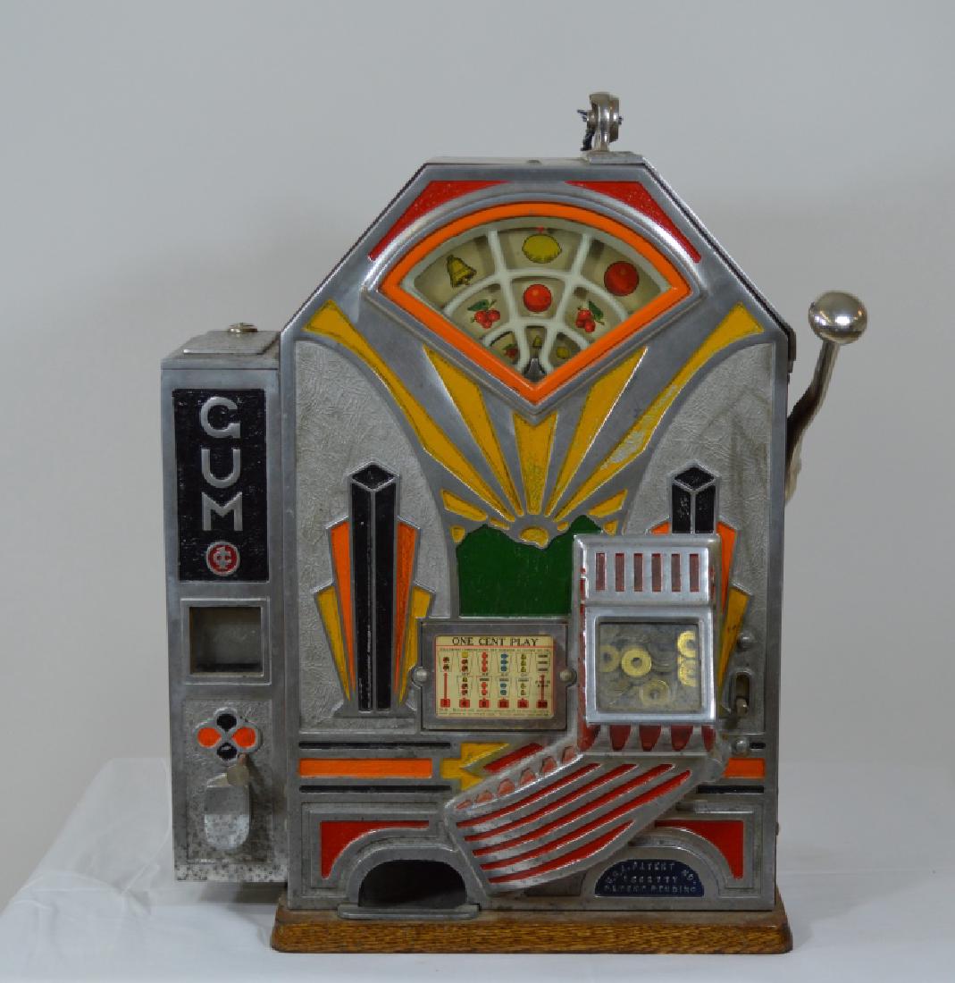 O.D. Jennings "Little Duke" Slot Machine: Art Deco style,takes tokens, with key and tokens, with side 1 cent gum vendor, quarter sawn oak case and back. Stands 22" tall. From a Doctor's Estate in Denver, CO.