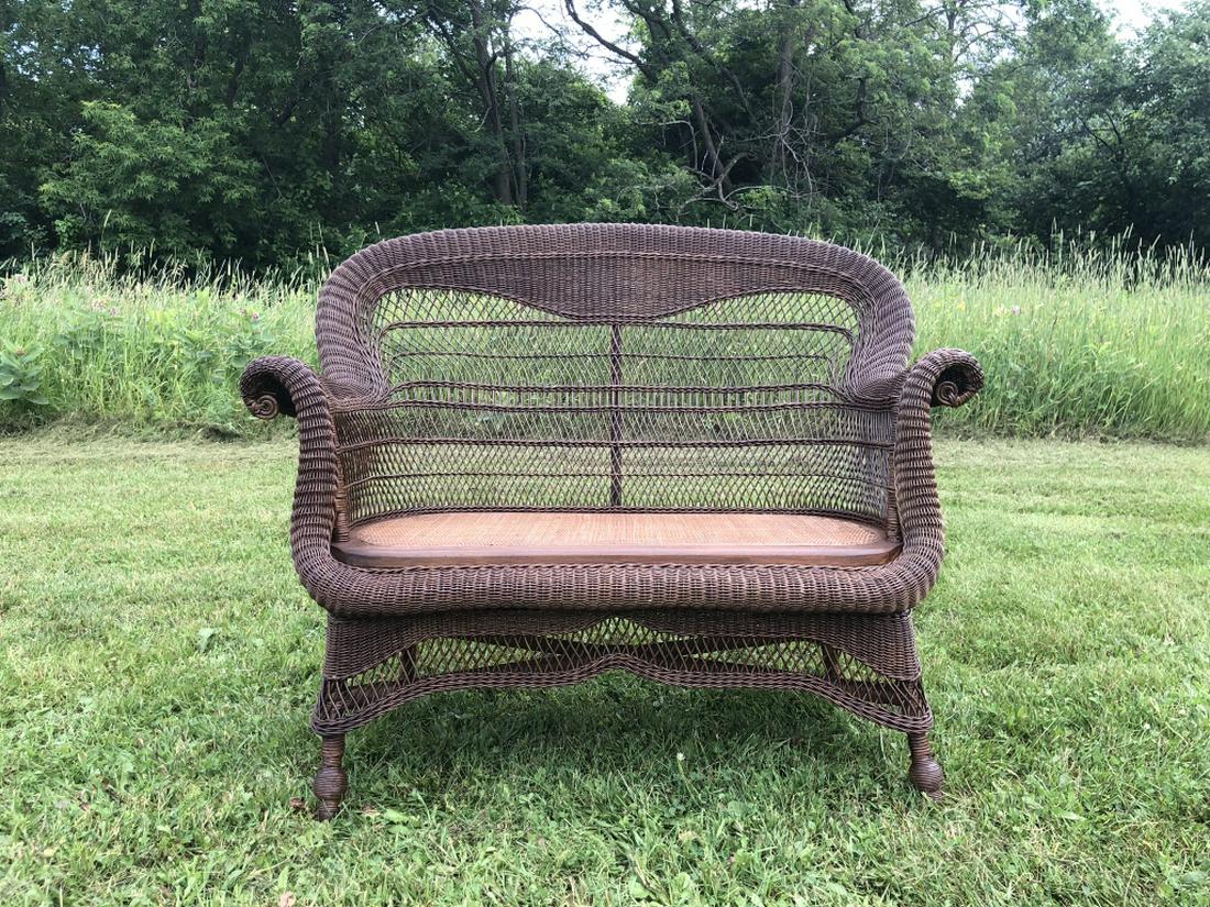 Victorian Wicker Settee in Natural Finish: with pressed caned seat. Circa 1880's -1890's. 44" wide