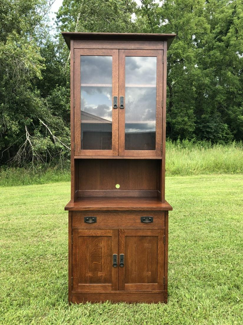 Modern Stickley Oak Two Piece Step Back Hutch: measures 32" x 83" x 19". In excellent condition.