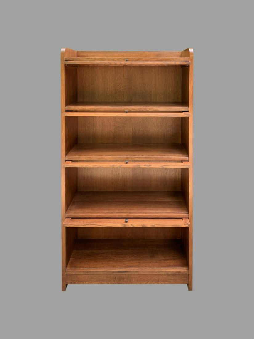 Modern Stickley Oak Barrister Bookcase: measures 64" x 33" x 12". In very good condition. One piece unit.