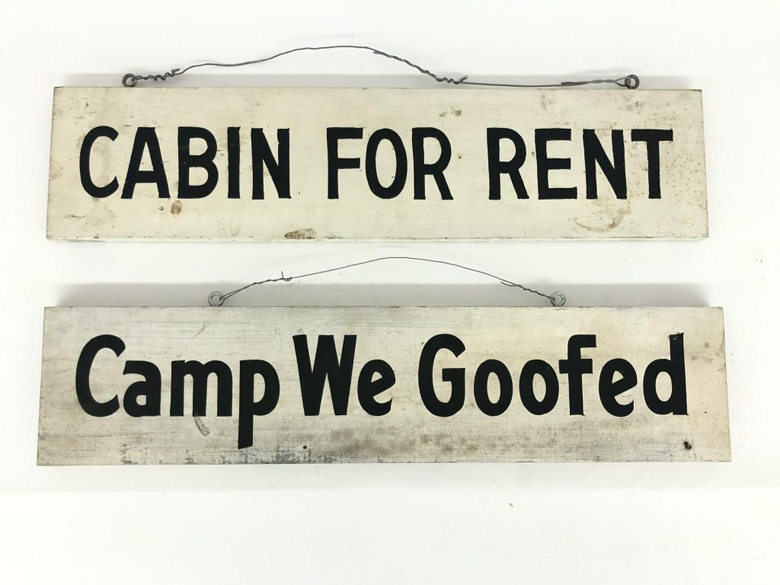 Two Wooden Adirondack Camp Signs: double sided. Black painted letters on white board. 24" x 5 1/2" Camp We Goofed and Cabin for Rent. Sign photographed in Cabin Collectibles by Ralph Kylloe on page 81. From the authors personal collec