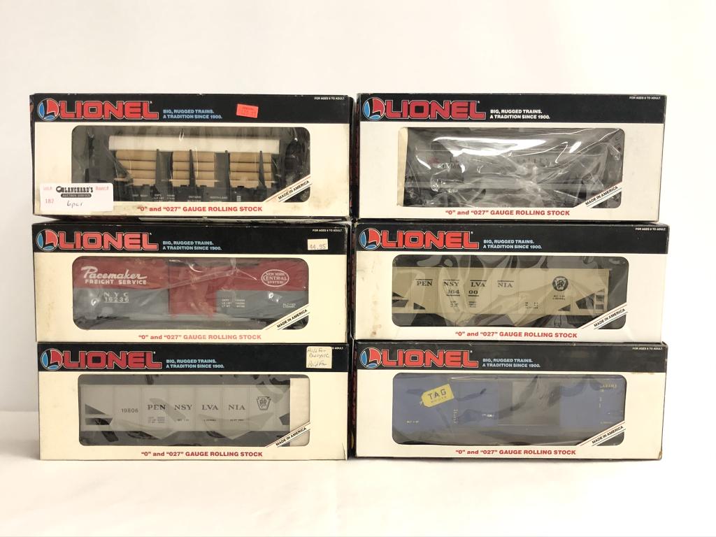 6 Lionel Trains: 16347 Ontario Flat Car with Logs 16400 PA Hopper 16236 NYC Box Car 16103 LV Tank Car 19806 PA Hopper19231 TAG Box Car All trains are from the Dwayne Martin Estate from Gouverneur, NY. He was an avid l
