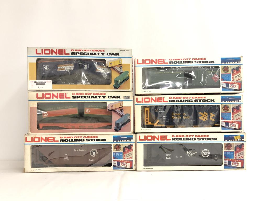 6 Lionel Trains: 6531 Express Mail Flat Car with Vans 9282 GN Piggy Back with Trailers 6102 Great Northern Hopper 6110 MP Hopper 6100 Ontario Hopper5709 Railway Express Reefer All trains are from the Dwayne Martin Est