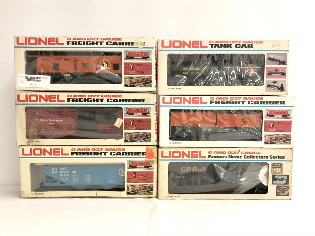 6 Lionel Trains: 6438 GN Caboose 9450 GN Cattle Car 9011 GN Hopper 9604 GN Tank Car 9449 GN Box Car9417 CP Rail Box Car All trains are from the Dwayne Martin Estate from Gouverneur, NY. He was an avid lifetime collect