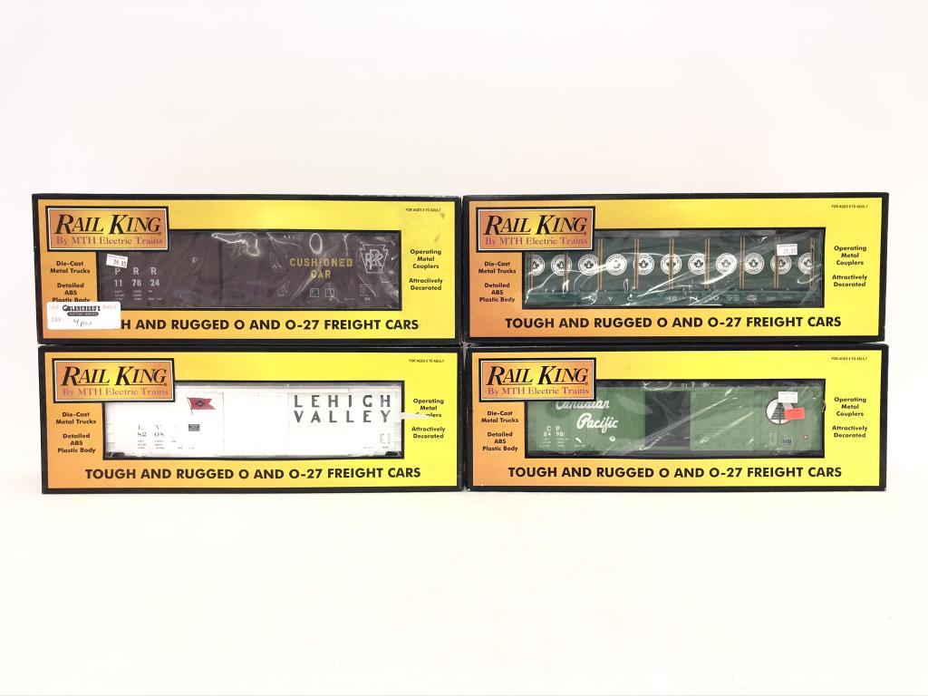 4 Rail King Trains - 7448, 7442, 76059, 74069: 7448 PA Box Car 7442 LV Box Car 76059 NYC Flat Car with Lumber 74069 CP Box CarAll trains are from the Dwayne Martin Estate from Gouverneur, NY. He was an avid lifetime collector of "O" gauge trains a