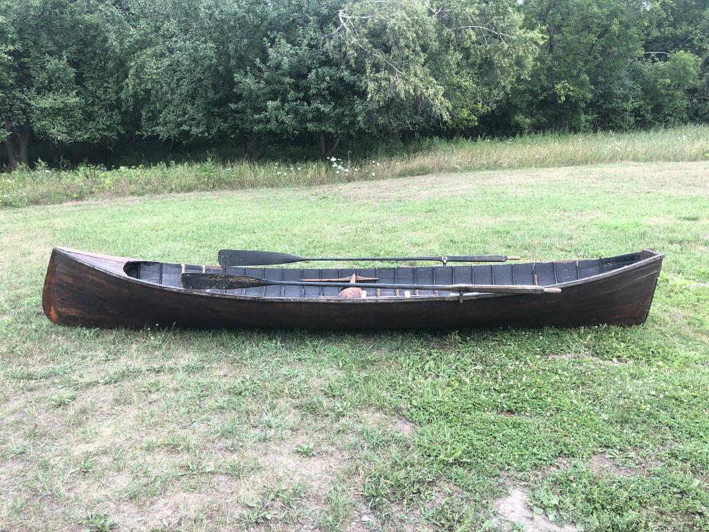 Adirondack Guideboat Attributed to George & Bliss: Lake Placid, NY builder. This guideboat was purchased in the 1960's from a retired conservation officer and has hung in the rafters of a camp in Indian Lake, NY ever since. Includes a set of oars, 2 s