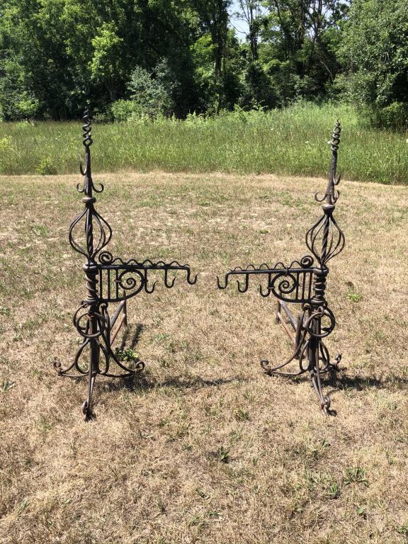 Massive Pair of Ornate Hand Forged Andirons: stands 50 1/2 inches tall and 37 inches deep.