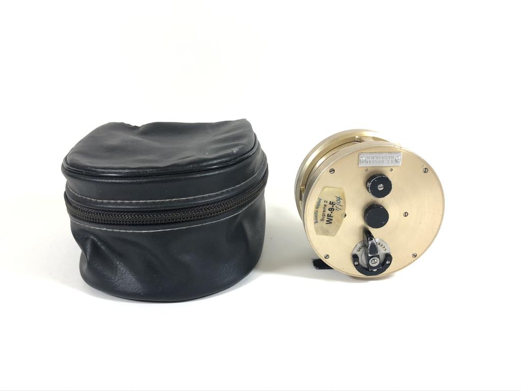 Stan E. Bogdan, Nashua, NH, Fly Reel: 3 1/2 inches in diameter. In good but used condition. Sticker marked Supreme 2 WF-9-FThe reel is left handed and on the bottom it is stamped AF 100 M