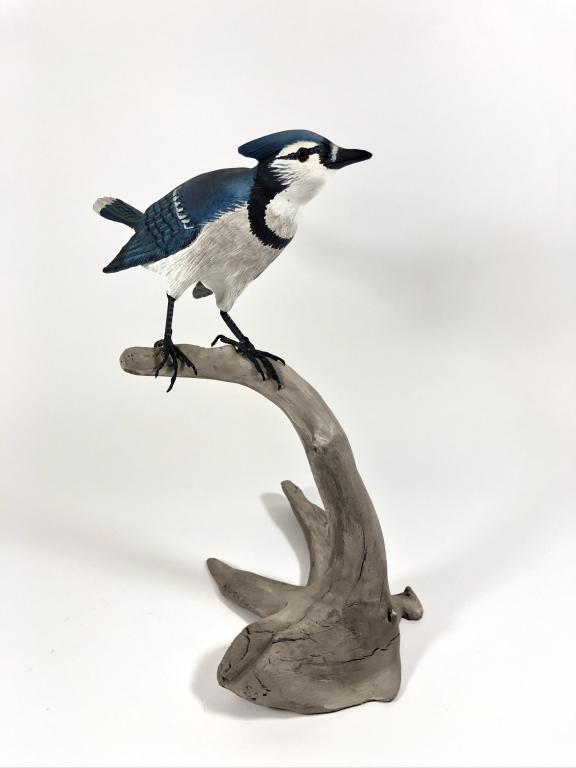 Harry Ross, Norway, Maine, Blue Jay: on driftwood, dated on bottom 1987, 12 inches tall.