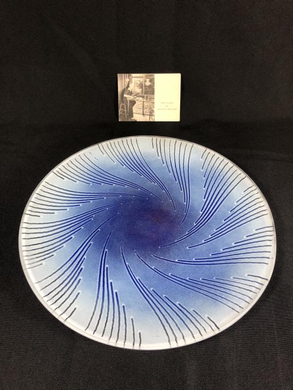 Maurice Heaton Modern Art Glass Plate: 12 inch in diameter blue and white plate. With original pamphlet.