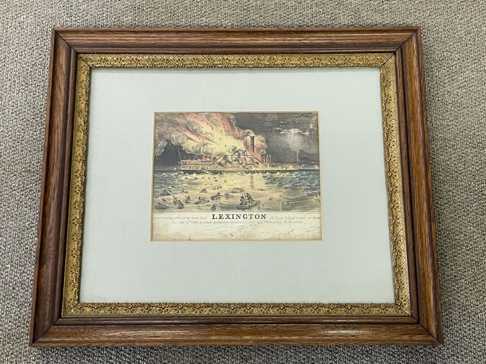 N. Currier, Lexington Disaster, Lithograph: 1840 Steam boat fire. Framed and matted. No examined out of frame. Sight size 8 1/2" x 11". Overall size 20 3/4" x 24 3/4". From a private collection on Upper Saranac Lake in the Adirondacks.