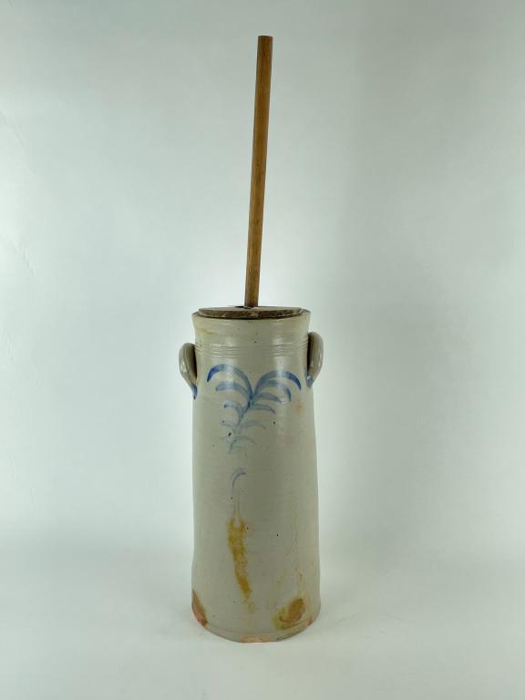Smith and Day 4 Gallon Stonware Butter Churn: cobalt blue decoration, with dasher and lid, double eared. Damaged and repaired bottom, hairline crack on one side. From the Rett Foster Collection in Clayton, NY.