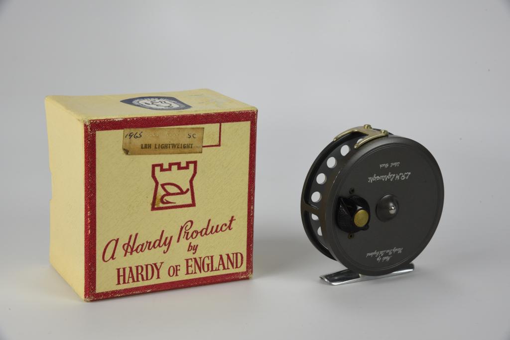 Hardy L.R.H. Lightweight Fly Reel: 3 1/8” diam, 11/16” spool, set for left hand wind, silent check, plastic drag knob, appears unused, Ex condition in correct marked red border box.