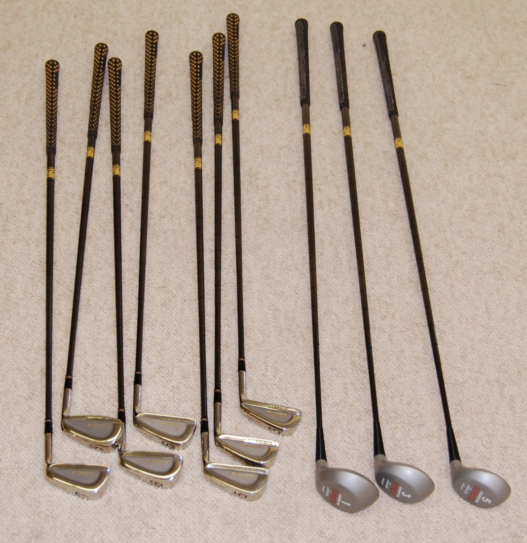 Set of 19 Cobra Right Handed Golf Clubs: 1989-1990 Brand New Clubs. 1 , 3, 5 Metal Woods (TRD Series) 3, 4, 5, 6, 7, 8, 9 Irons (Cobra Baffler Blade II AMS 5355) and putter. Shafts are black steel medium