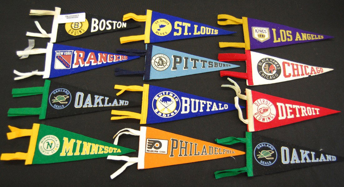 Twelve 8 1/2" NHL felt pennants 