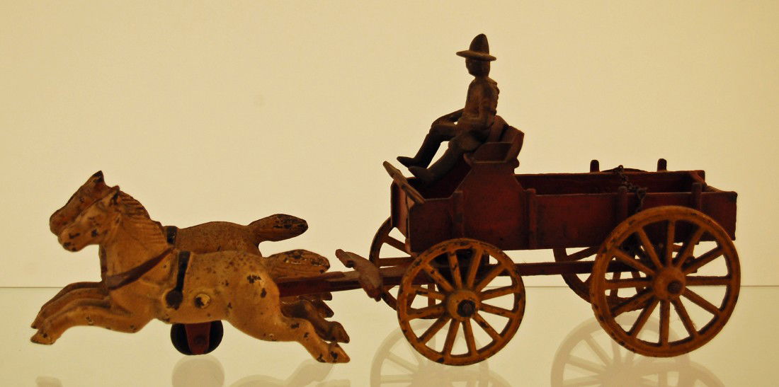 Cast iron toy - Horses pulling Buck Board Wagon: 11 1/2 inches long