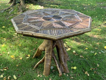 Barney Bellinger Adirondack Mosaic Root Base Center Table: with a octagonal top, yellow birch root base, made by The Sampson Bog Studios. 28" tall x 3' top.