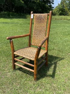 Old Hickory Oversized Arm Chair: with original splint seat and back. Branded Old Hickory. 45" tall.