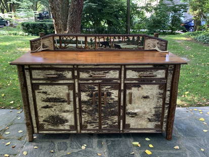 George Jaques Adirondack Sideboard: made in Keene Valley, NY with repurposed pine top and white birch veneer. Carved and painted bear back splash by Gannon / Trivieri. 64" wide x 42" tall x 21" deep.