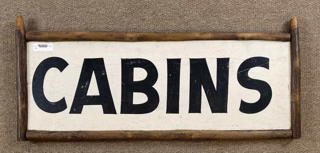 Painted Cabins Sign in a Hickory Frame: approximately 38" x 16" . Sign painted on masonite.