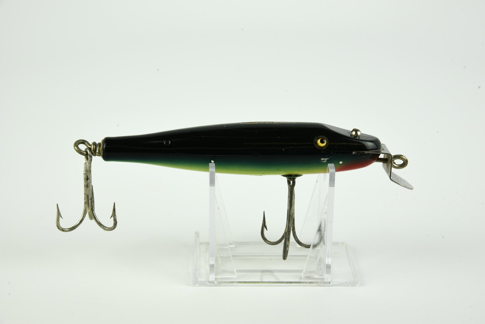 Creek Chub Saltwater Pikie: Scarce wire through 735SW, purple eel, good glass eyes, about VG+.