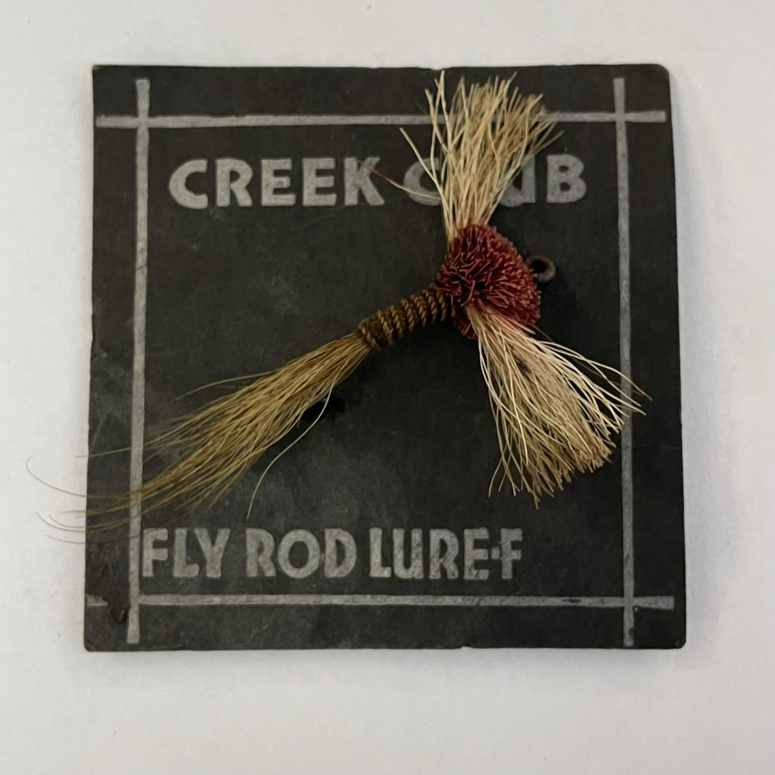Creek Chub Flyrod Bug-A-Moth: This exact F-505 lure and its original black card are pictured on page 149 of “Creek Chub Lures & Collectibles”. A very short production bait from the 30’s, red and white, a bit flat