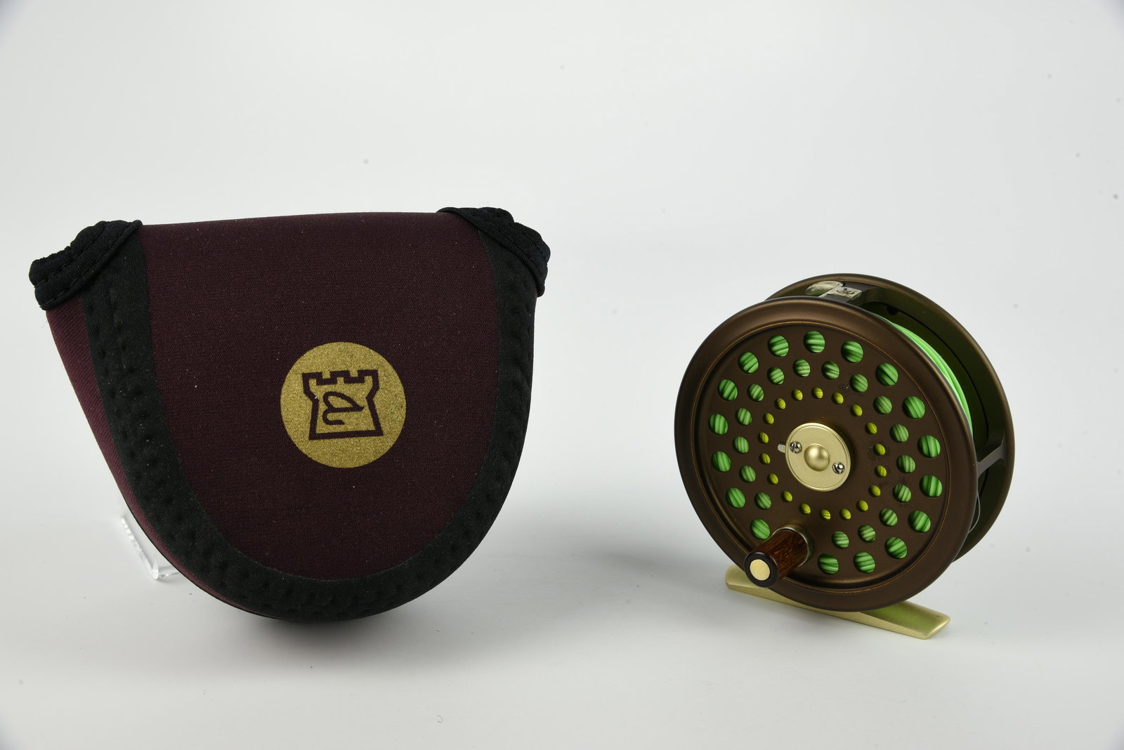 Hardy Golden JLH Ultralite No. 6 Trout Reel: 3 1/4” diam, 3/4” spool width, two screw spool latch, working rear drag adjustment, used Ex- condition, in a Hardy marked pouch.