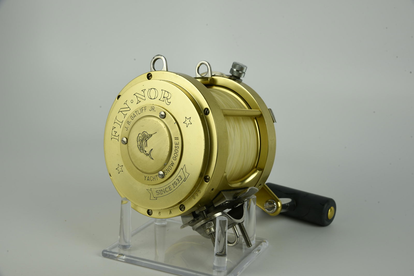 Fin-Nor Big Game Reel: 4 3/8” diam, 2 1/4” wide spool, marked “6A 293”, VG+/Ex- condition, could use cleaning.